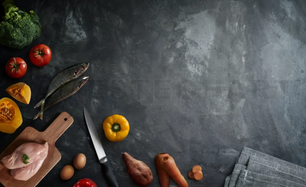 
Healthy cooking ingredients with fresh food on dark background
