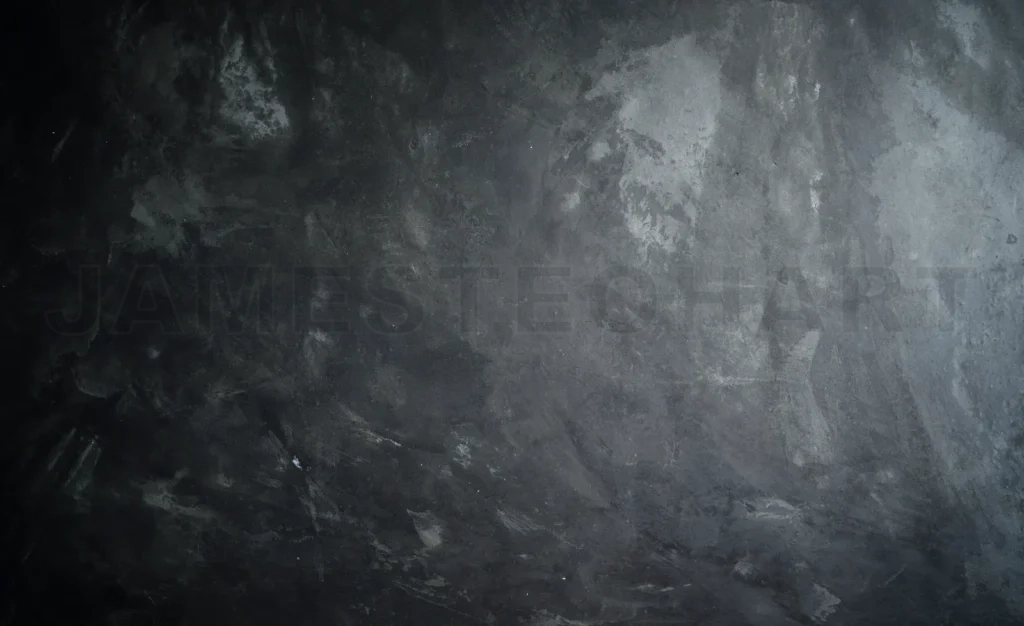 
Dark concrete wall surface with rough texture