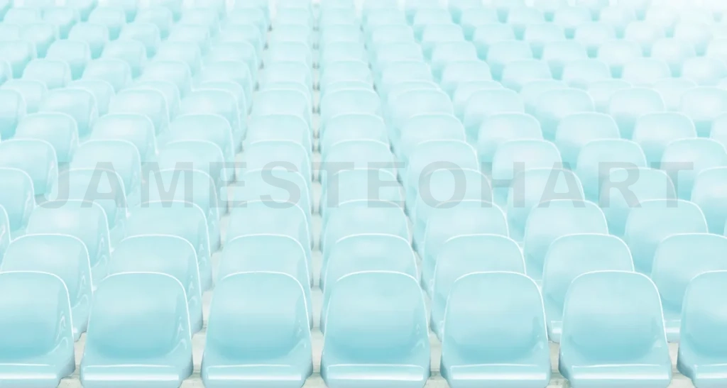 
Empty stadium seats creating patterns in rows