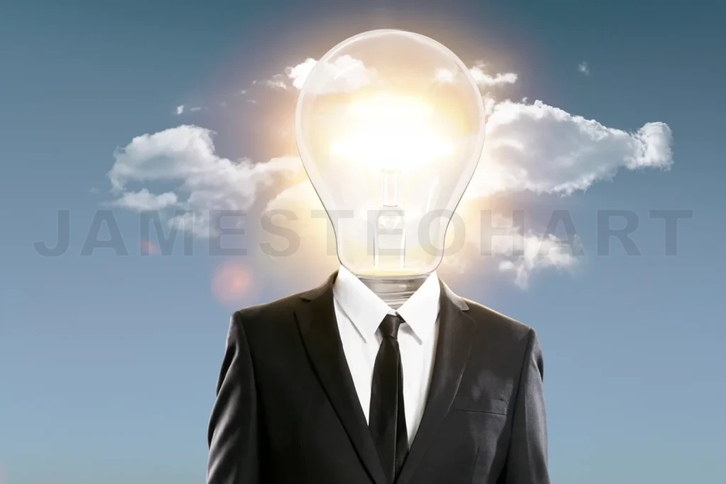 
Businessmen in a suit with a light bulb head.
