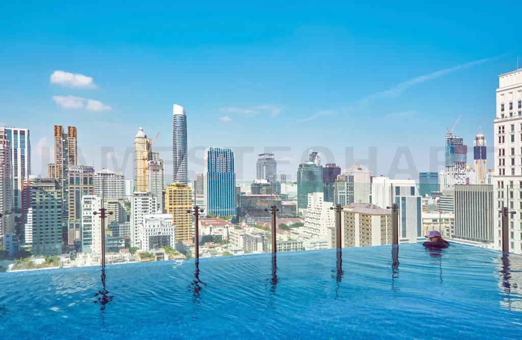 
Young women in a rooftop swimming pool