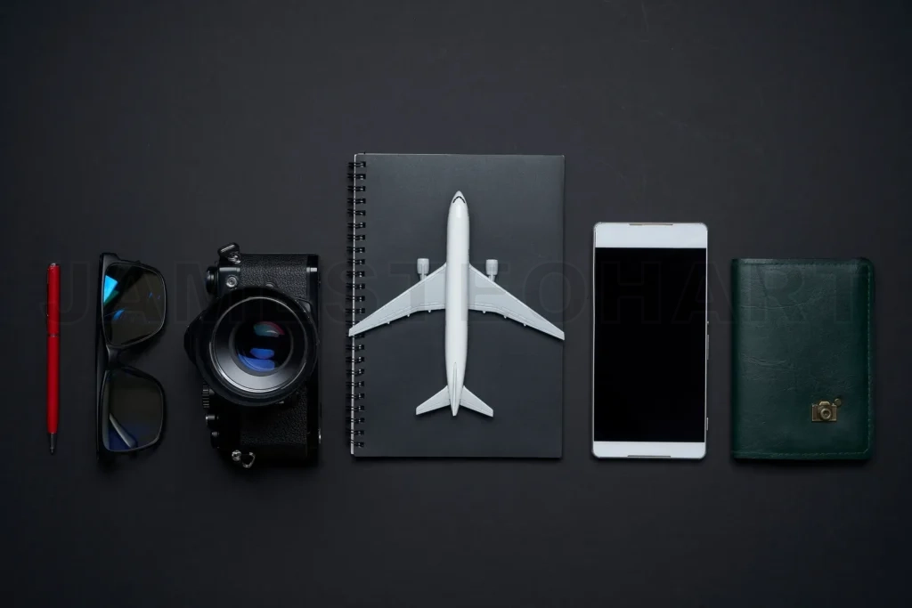 
Outfit ,accessories and equipment of traveler on black backgroun