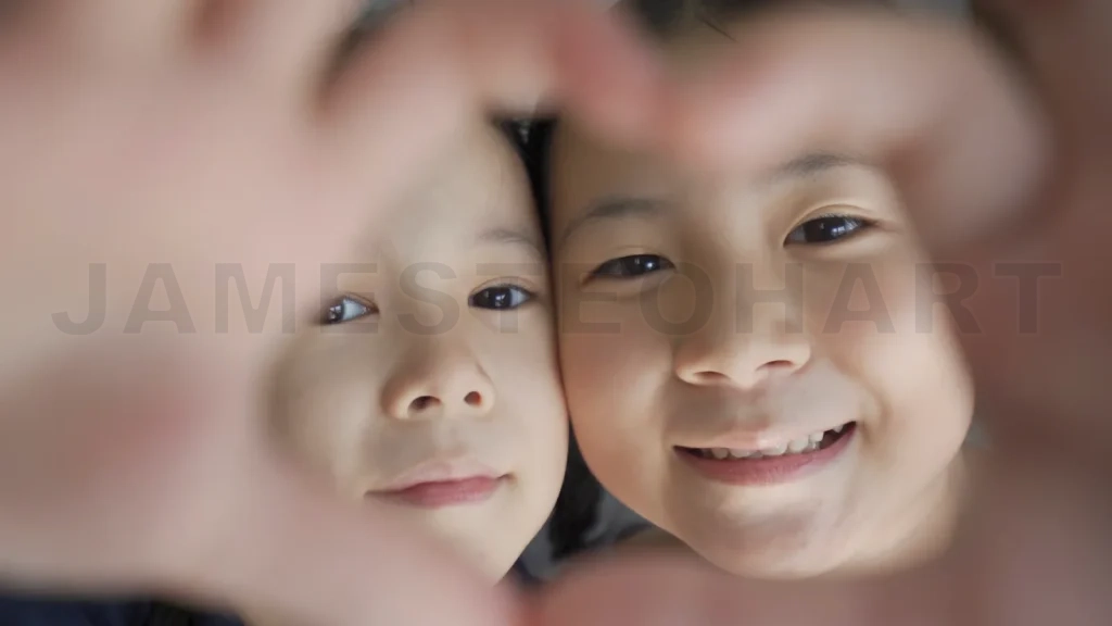 
Happy sister make heart shape hand gesture