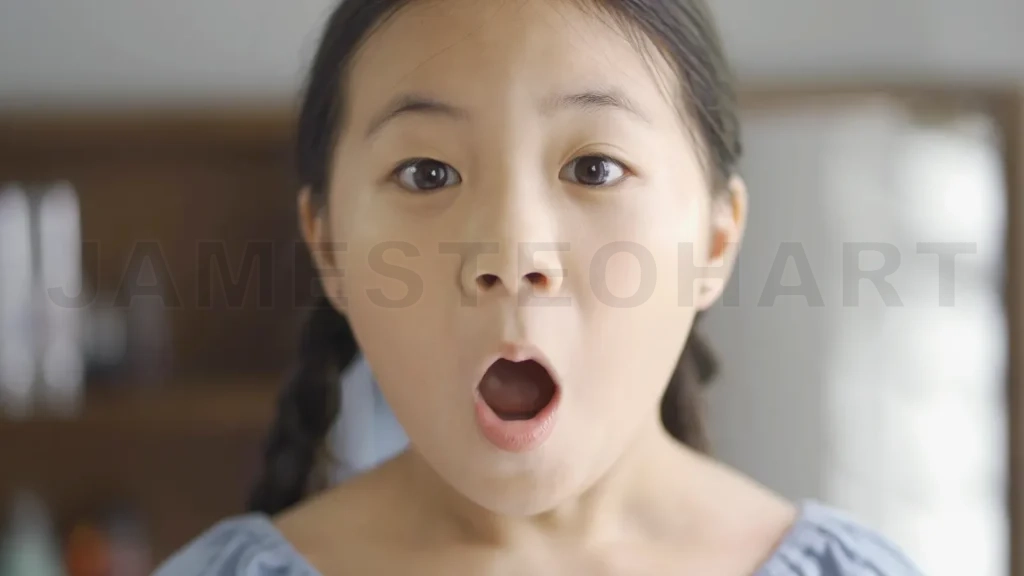 
Asian little girl scared expression