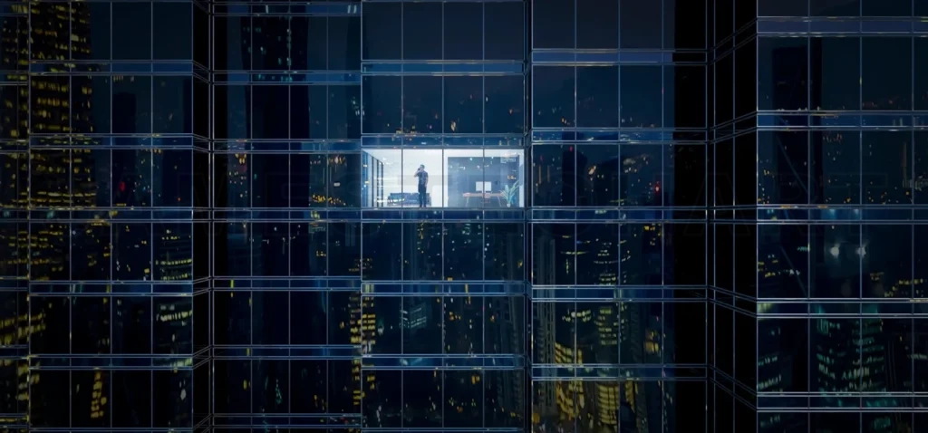 
Businessman using mobile phone to talk business in office.