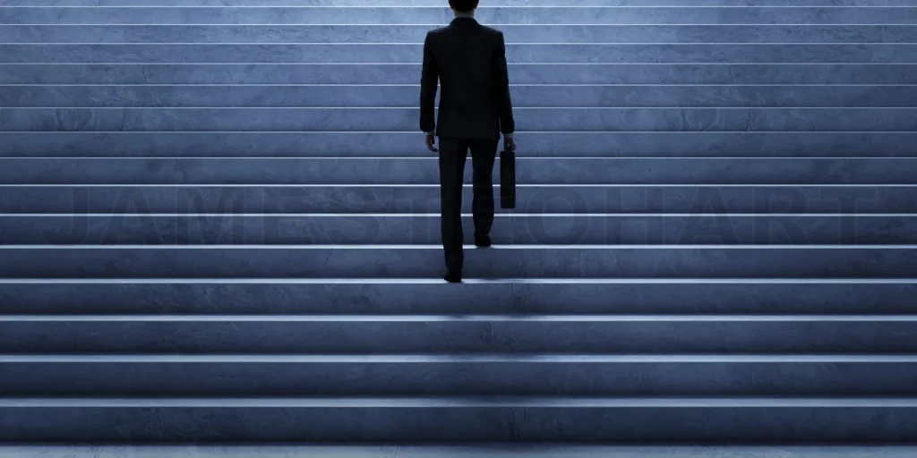 
Businessman climbing stairs. Ambitions concept .