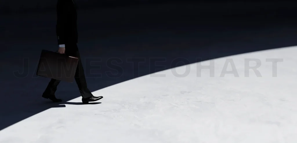 
Closeup Businessman walking in the shadow