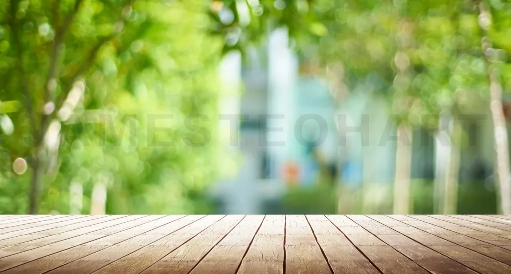 
Wooden table top with blur green from garden