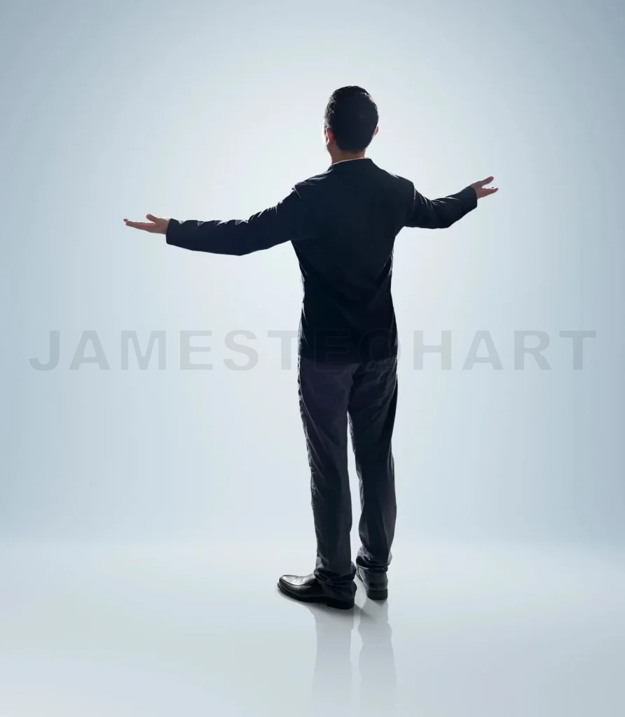 
Rear view angle of Businessman standing and lift up the hands