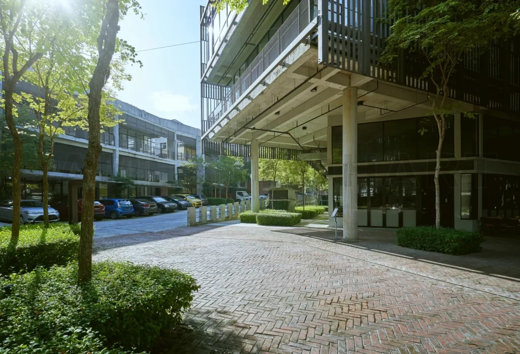 
Empty footpath with modern office building