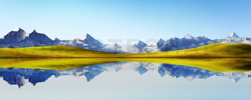 
Panorama view of beautiful snow-capped mountain and grassland  l