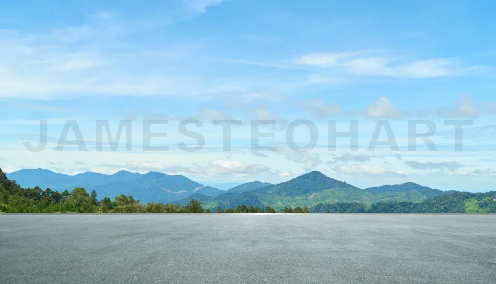 
Highway road leading to beautiful mountain landscape with blue sky