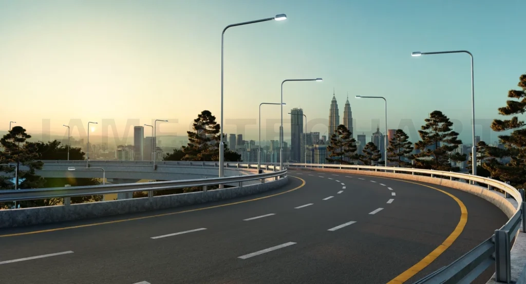
Empty highway leading to kuala lumpur city center at sunrise