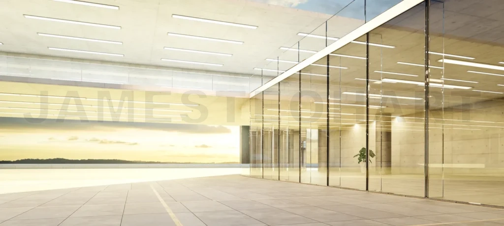 
3D Modern office building facade at sunset