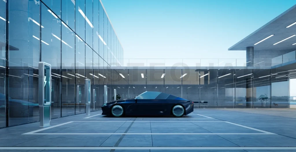 
Electric sports car charging at modern glass building