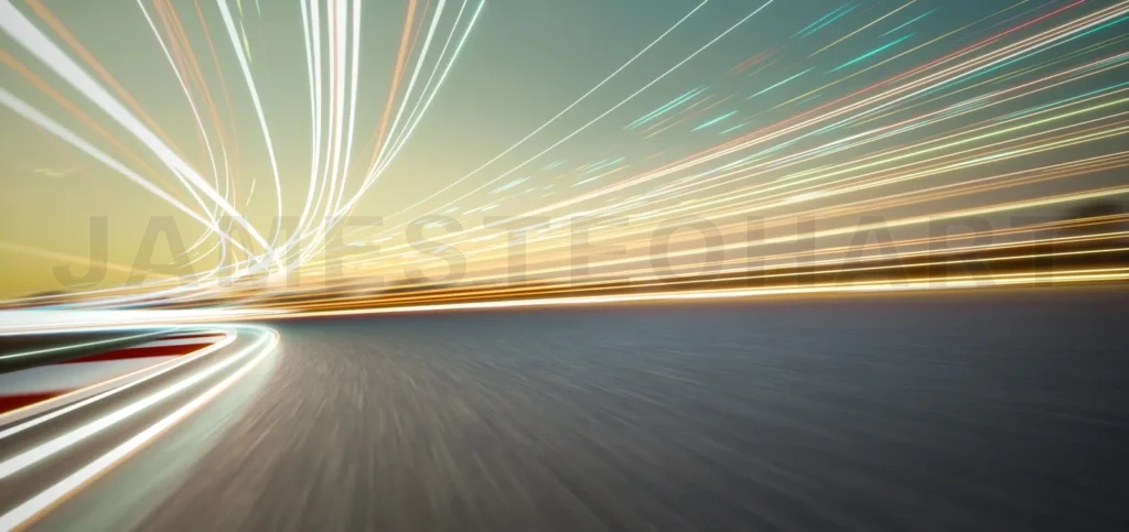 
3d rendering speeding on a racetrack with motion blur and light trails at sunset
