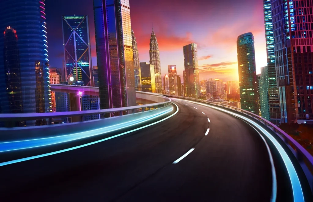 
Highway Overpass Motion Blur With City Skyline And Urban Skyscrapers , Sunset And Twilight Scene