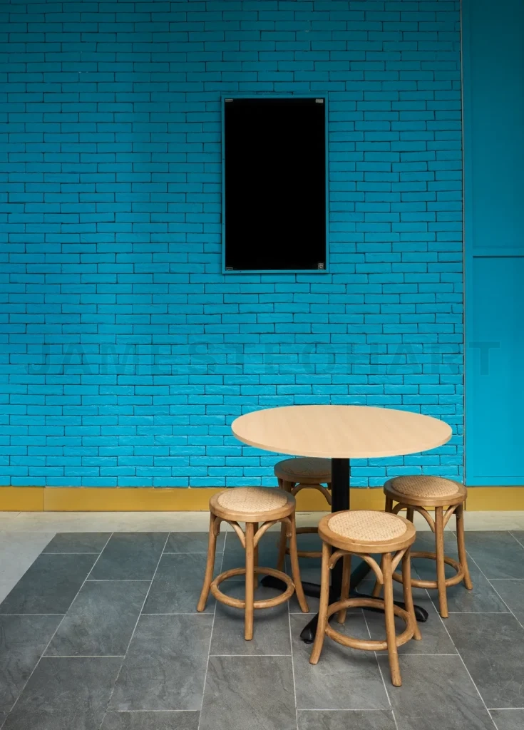 
Tables and chairs at sidewalk cafe