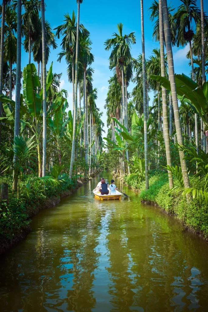 
Asian family kayaking on the river in a beautiful place outside