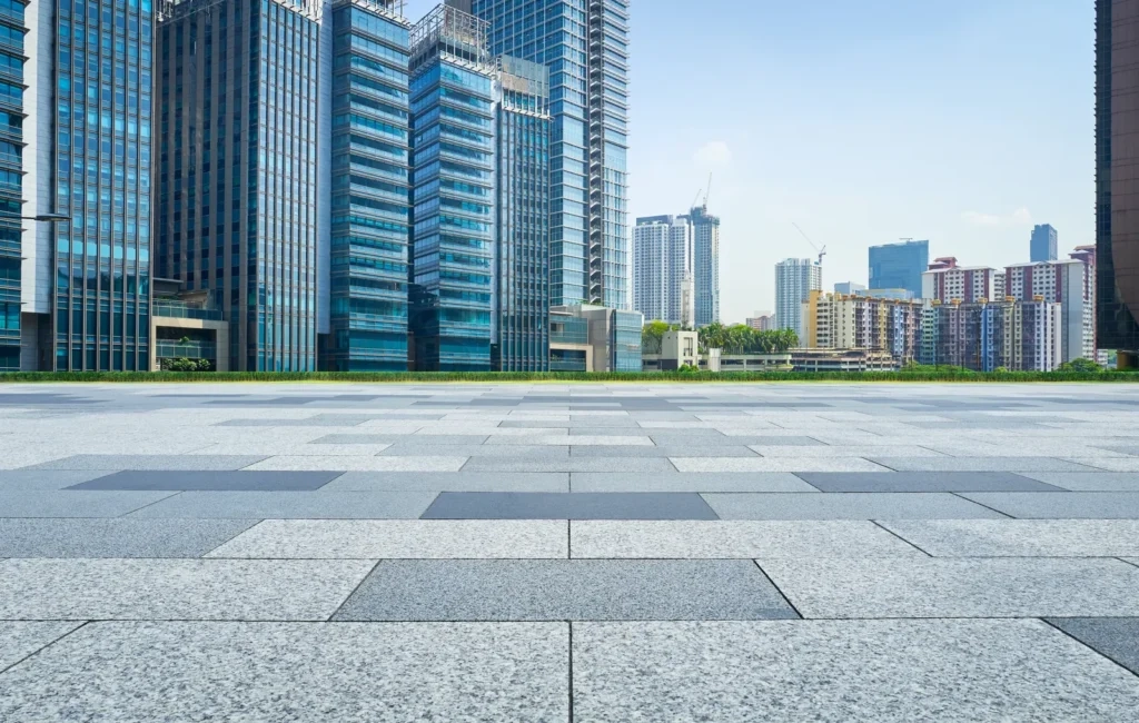 
Empty square facing modern business buildings in big city