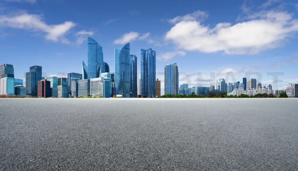 
Empty asphalt road and modern city skyline panorama under blue sky