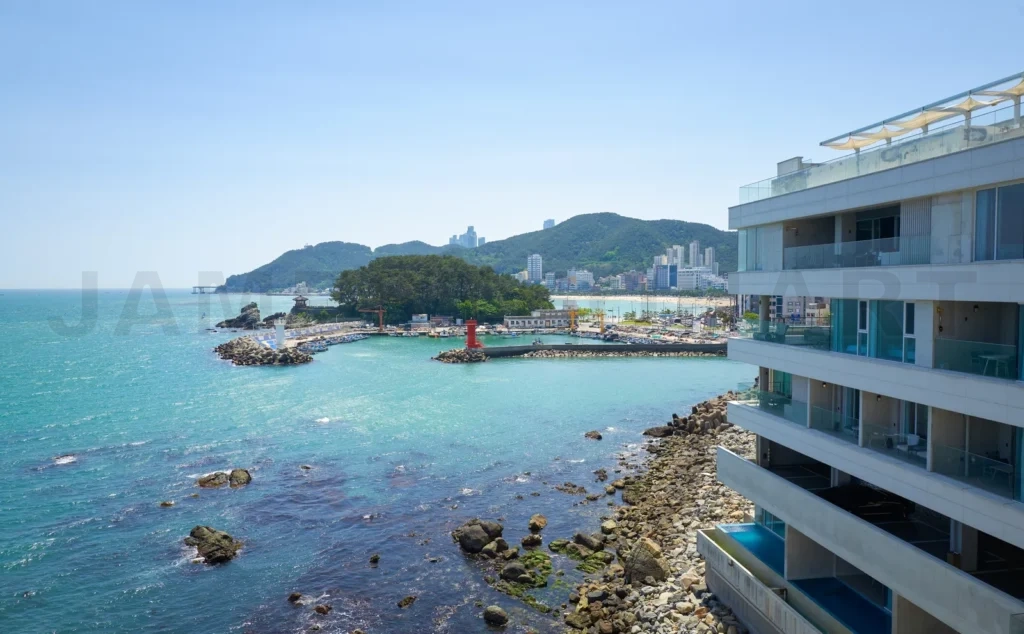
Serene coastal cityscape with lighthouse