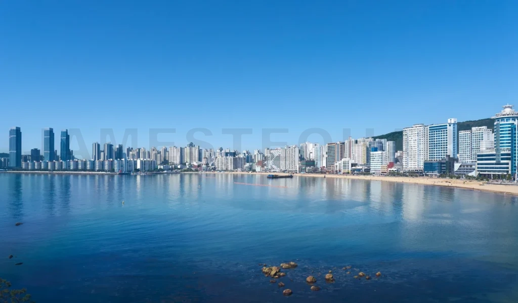 
Gwangalli beach skyline with modern buildings reflected in the w