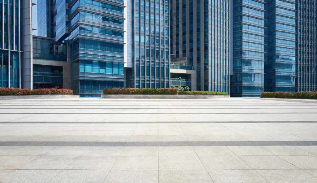 
Empty floor with modern office buildings in the background