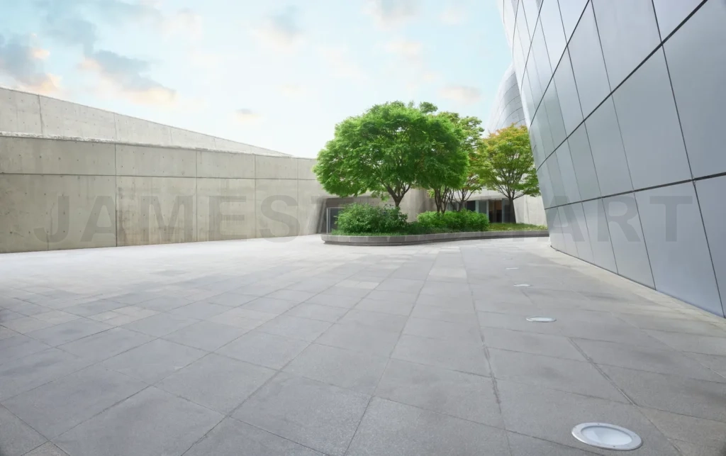 
Modern building exterior showing green trees growing in courtyard