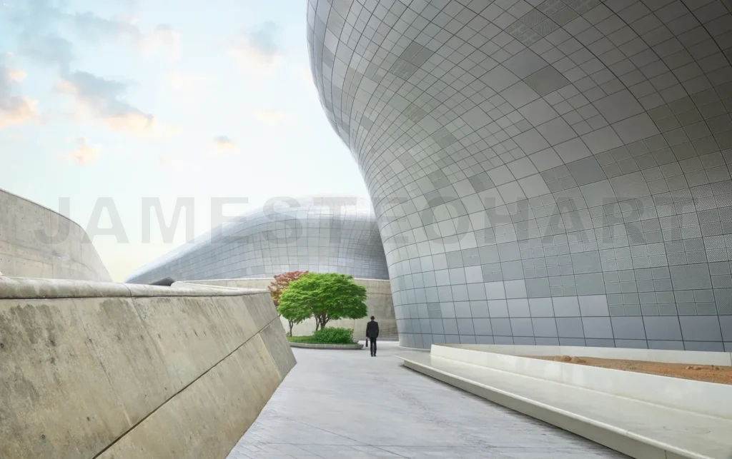 
Businessman walking in futuristic architecture in modern seoul city