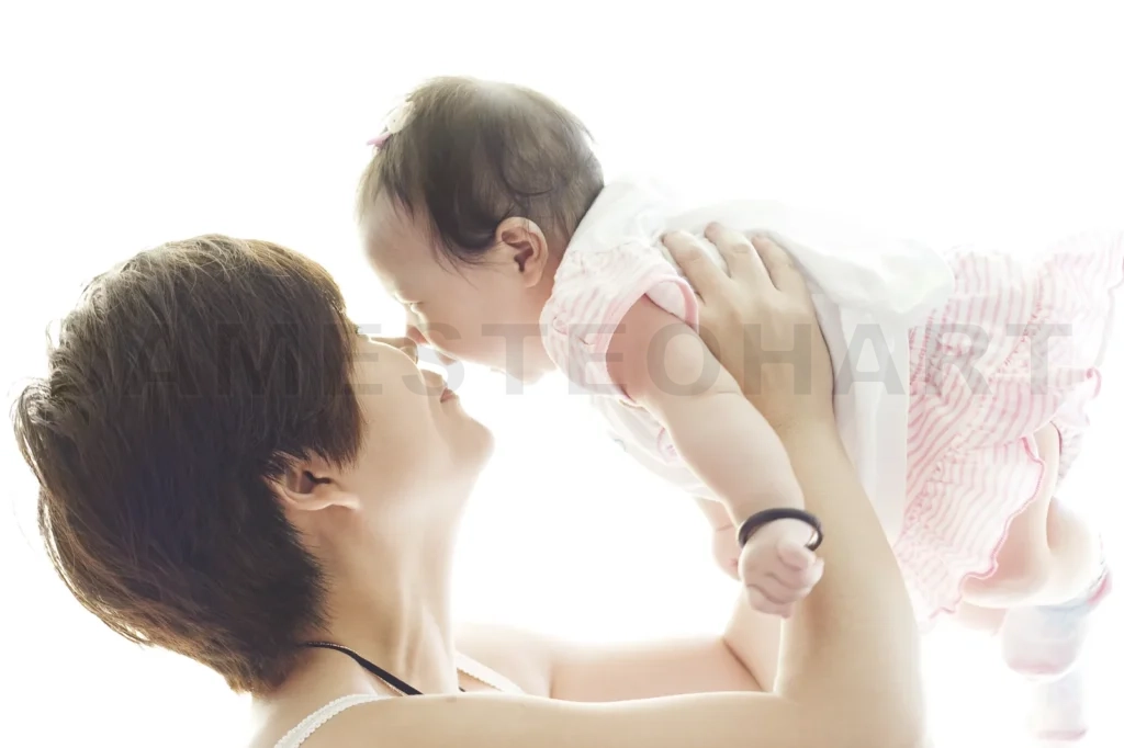 
Happy mother and smile baby