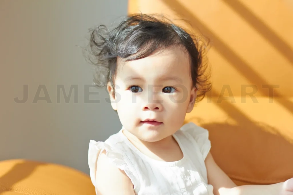 
Portrait Of Cute And Lovely Curly Hair Asian Chinese Baby Girl