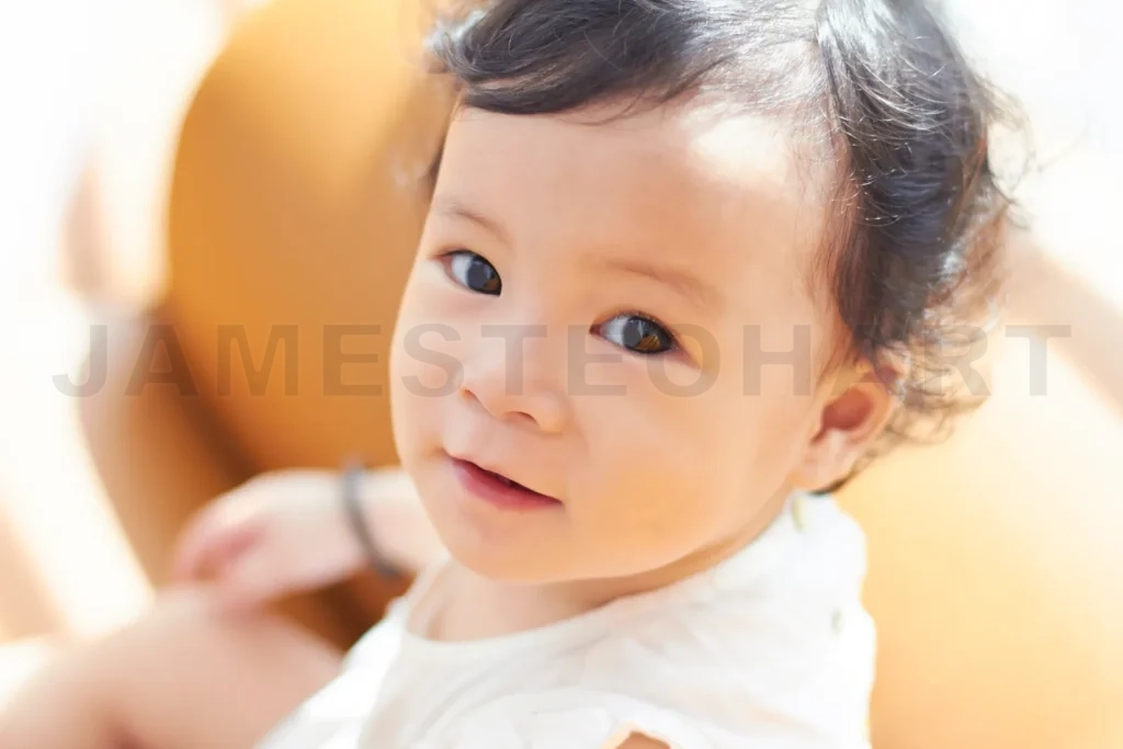 
Portrait Of Cute And Lovely Curly Hair Asian Chinese Baby Girl