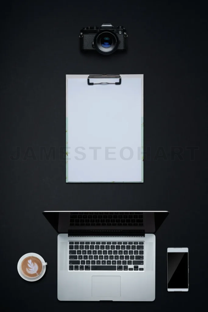 
Creative workspace arrangement with technology tools on desk