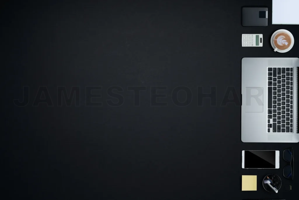 
Minimalist workspace with laptop, coffee, and business tools