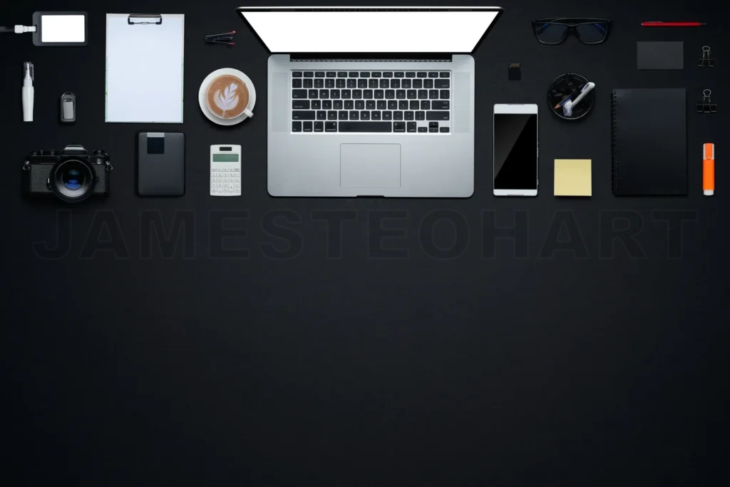 
Creative professional workspace with laptop and essential items