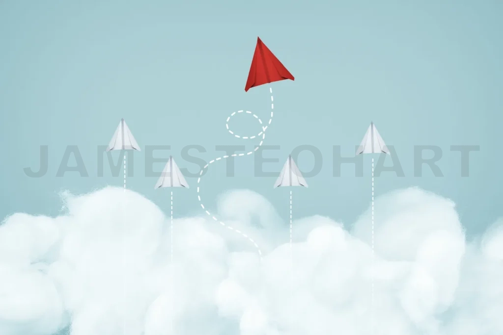 
Red paper plane breaking away from norm