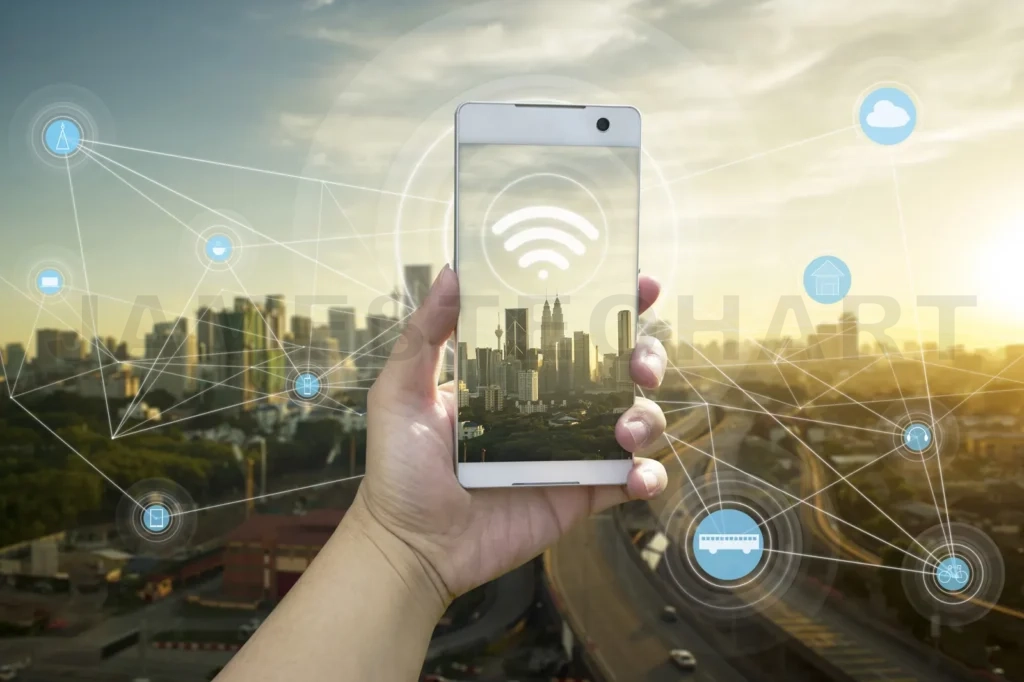 
Hand Holding White Phone With City Scape And Wifi Network Connection Concept