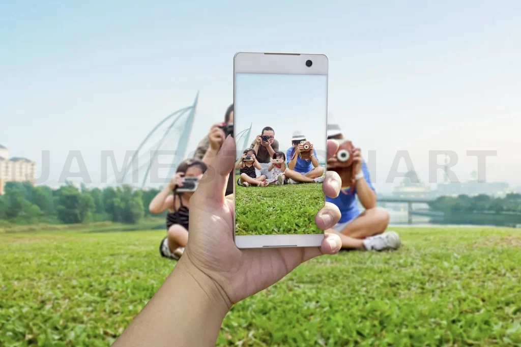 
Happy Family Taking A Photo Of Themselves At Picnic