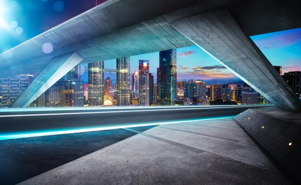 
Empty Asphalt Road Under The Bridge During The Night With Beautiful City Skyline Background