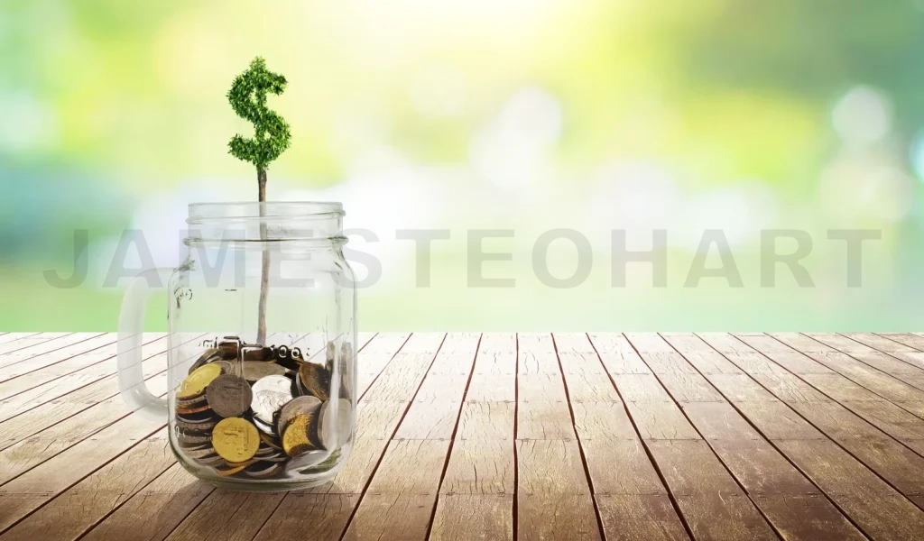 
Coins In The Glass With Money Shape Plant Growing ,Savings,Growing,Investment,Retirement And Education Concept